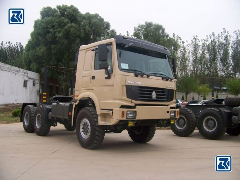 Front side view of a Sinotruck HOWO 6x6 Tractor Truck, with cab and heavy-duty wheel assembly on display