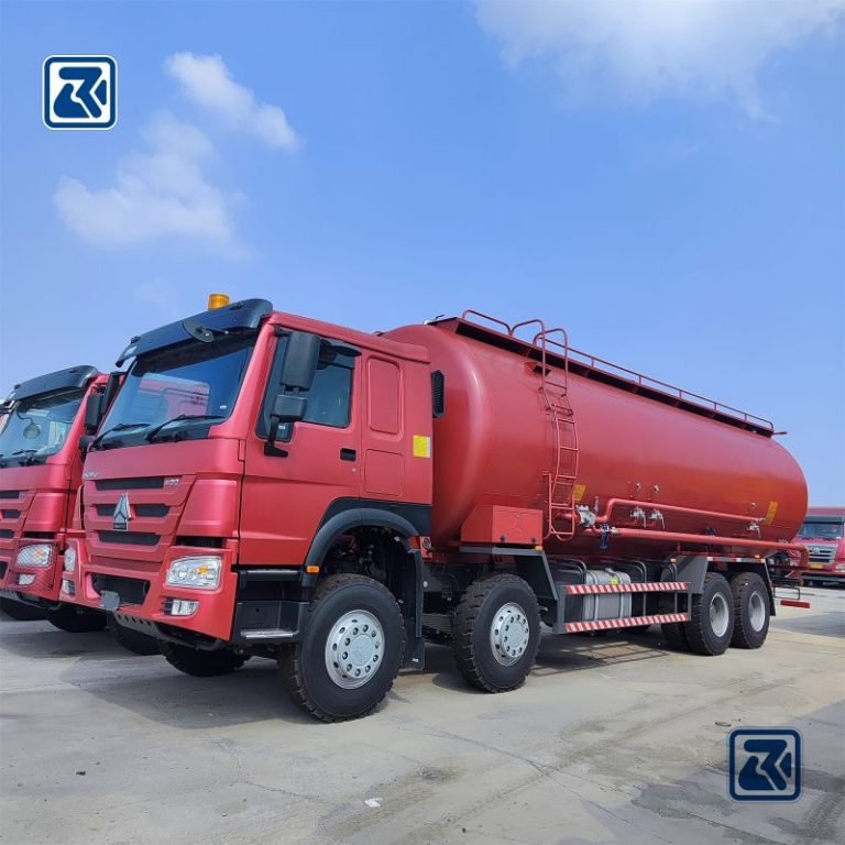 Side view of HOWO 8X4 Bulk Cement Truck showing the tank body and the truck's cabin