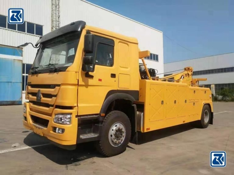 Front view of the HOWO 4X2 Heavy Duty Wrecker Truck with its towing unit and heavy duty tyres on display