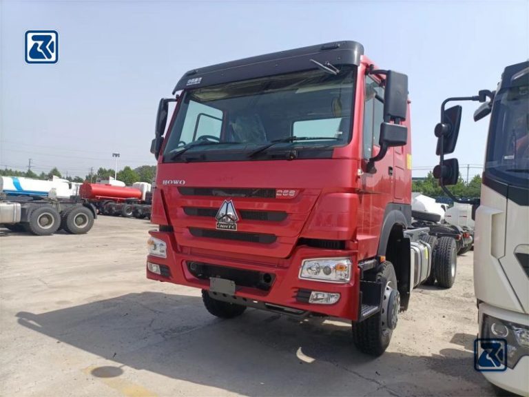 Red HOWO 4x2 Cargo Heavy Duty Truck angled front view with clear visibility of the cabin and chassis.