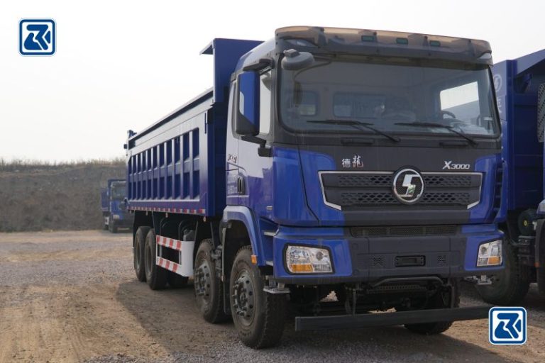 Front and side profile of the Shacman X3000 8X4 heavy duty tipper truck - Rugged design of the vehicle