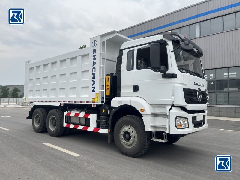 Side view of the Shacman H3000 Dump Truck 6X4, with its white cab and spacious tipper body highlighting its readiness for heavy-duty duties