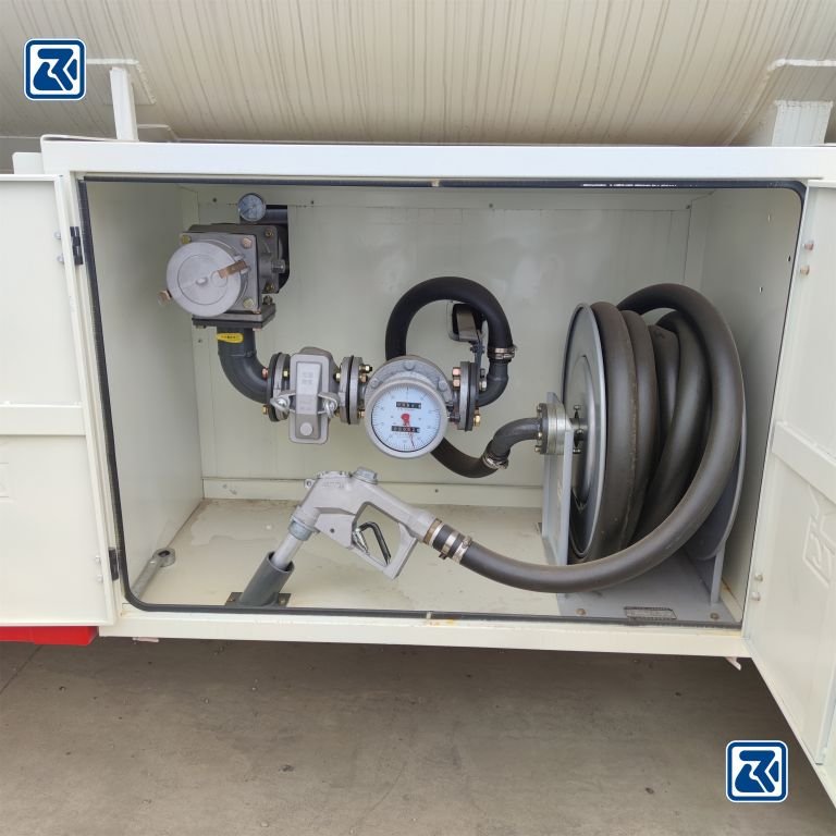 HOWO tanker fueling system showing fuel pump and hose configuration