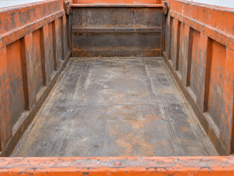 HOWO dump truck cargo body interior showing internal width and side height for loading volume